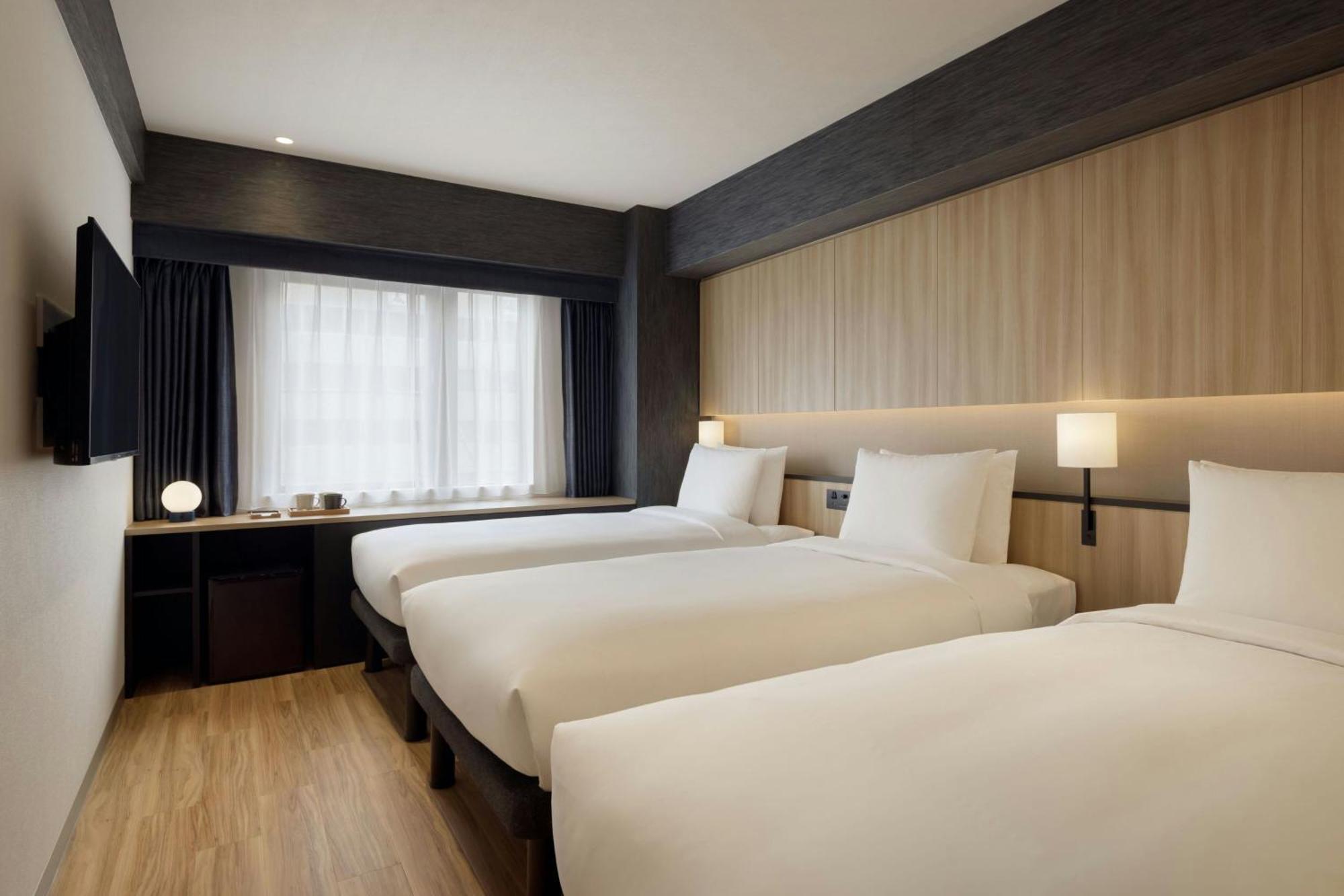 Twin Room with Two Twin Beds and Sofa Bed