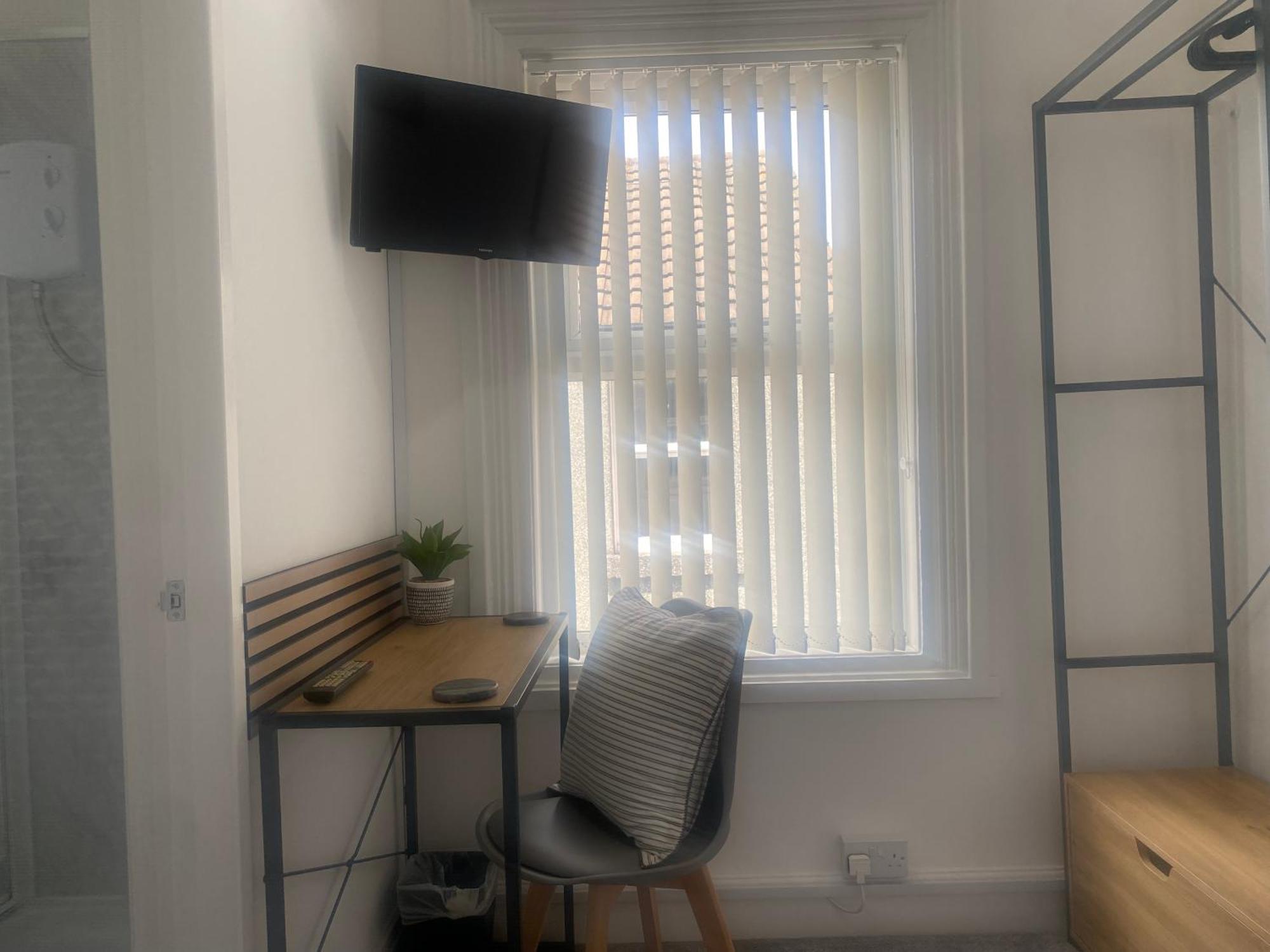 Quarto Individual com Banheiro Privativo