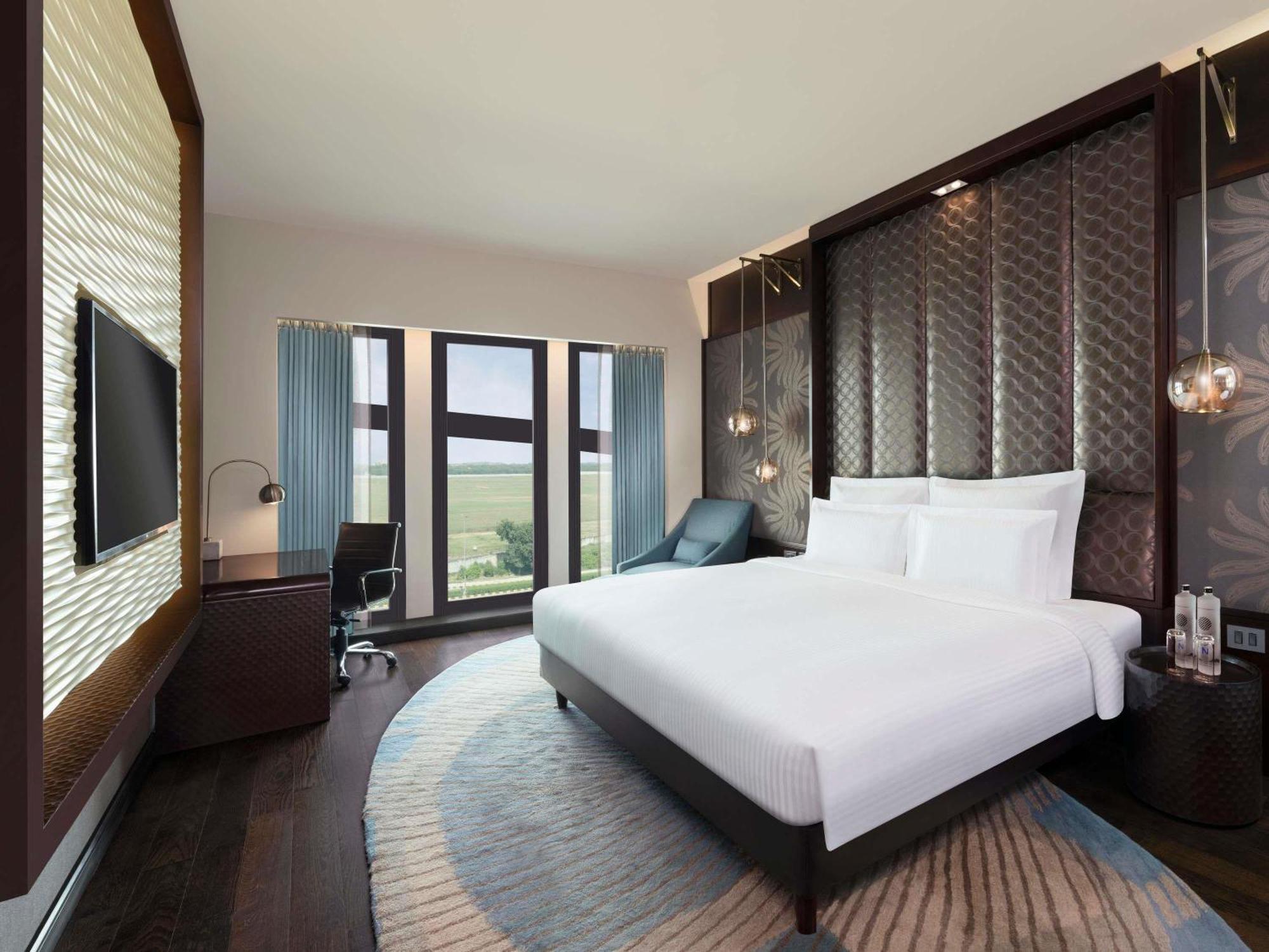 Executive King Room City View on food beverages spa laundry | Complimentary one way airport transfer | Lounge access cocktail hours