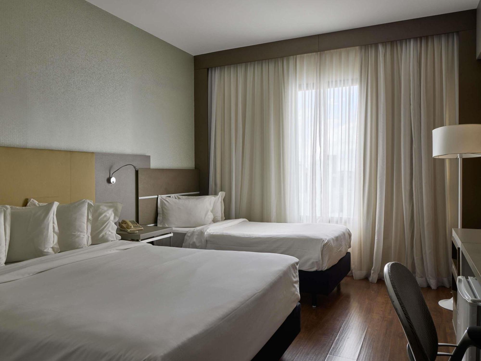 Quarto Superior com 1 Cama de Casal e 1 Cama de Solteiro