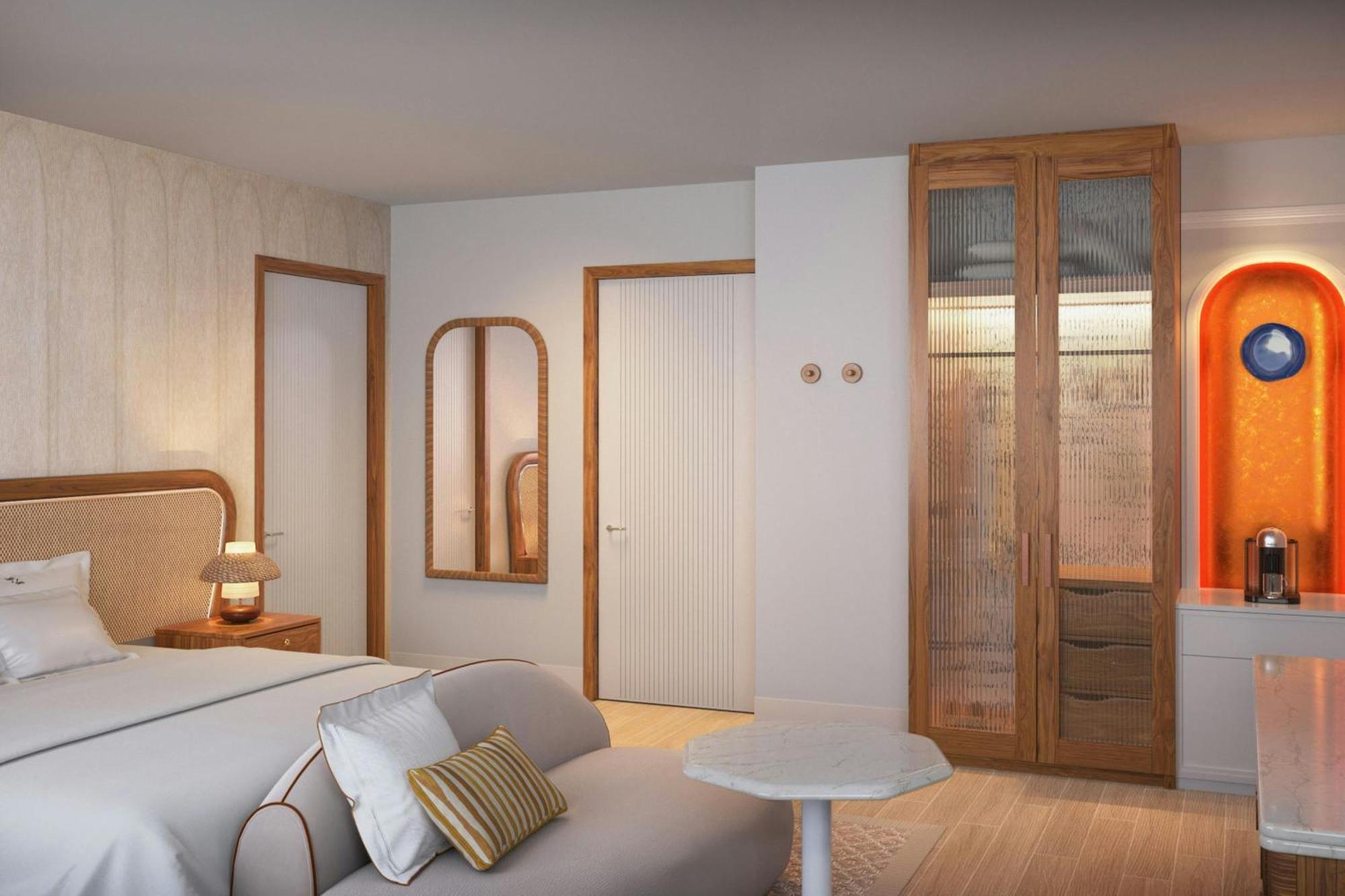 Habitación con cama extragrande y vistas al mar