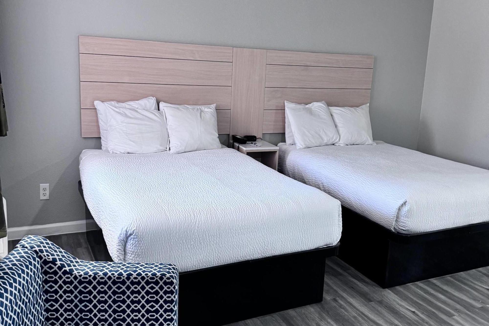Queen Room Two Queen Beds Roll Shower Mobility Access or Non-Smoking