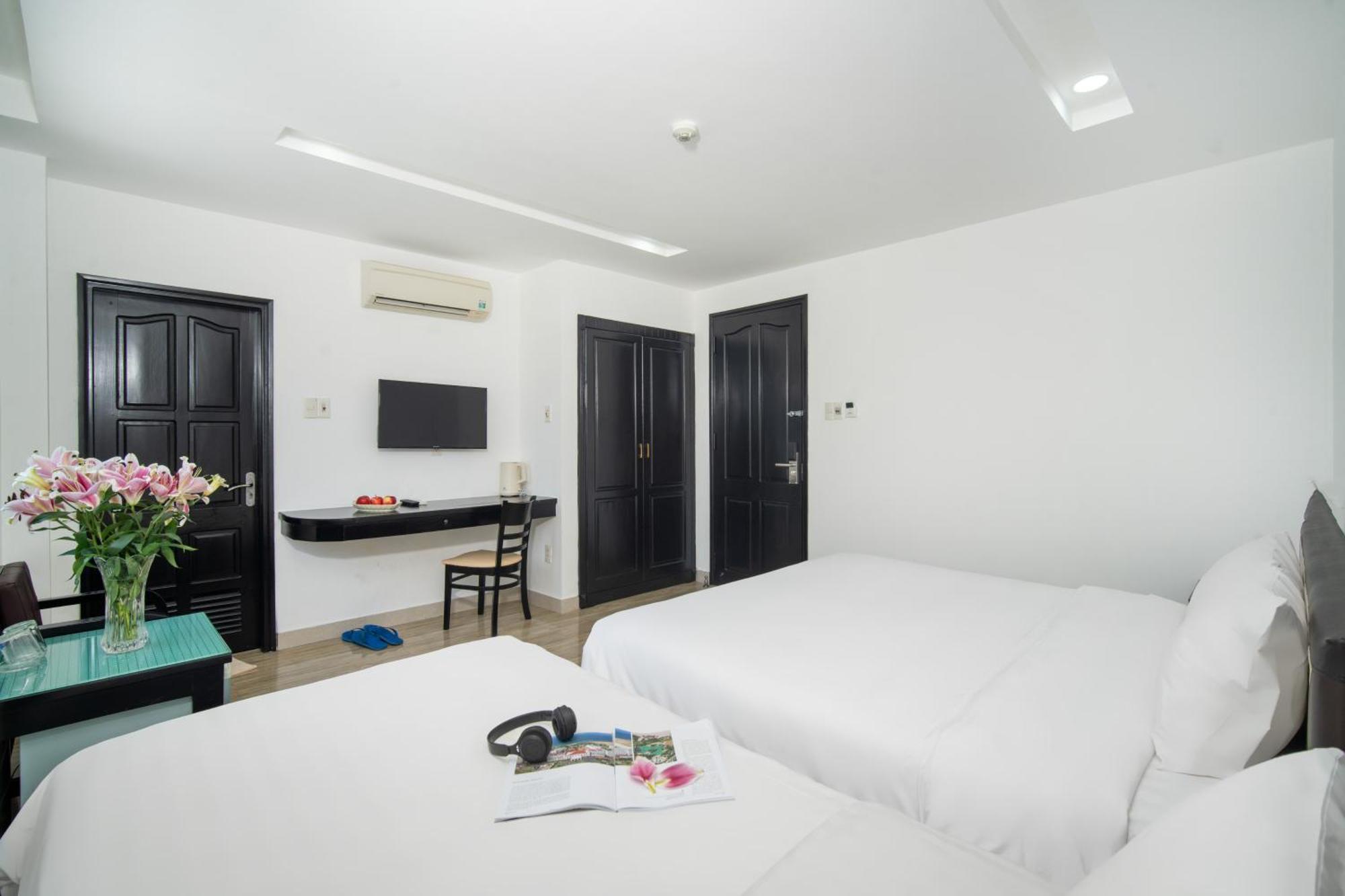 Deluxe Triple Room