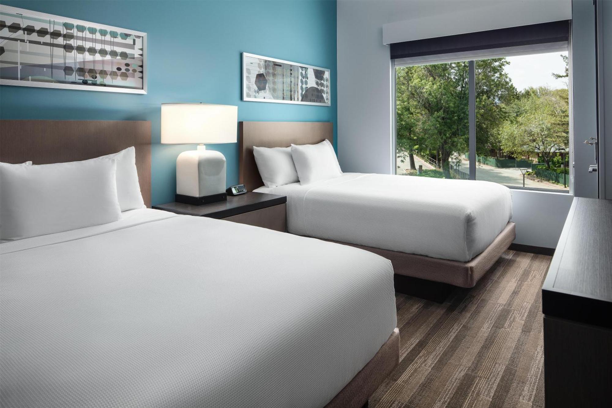 One Bedroom Kitchen Suite with Two Queen Beds and Sofa Bed