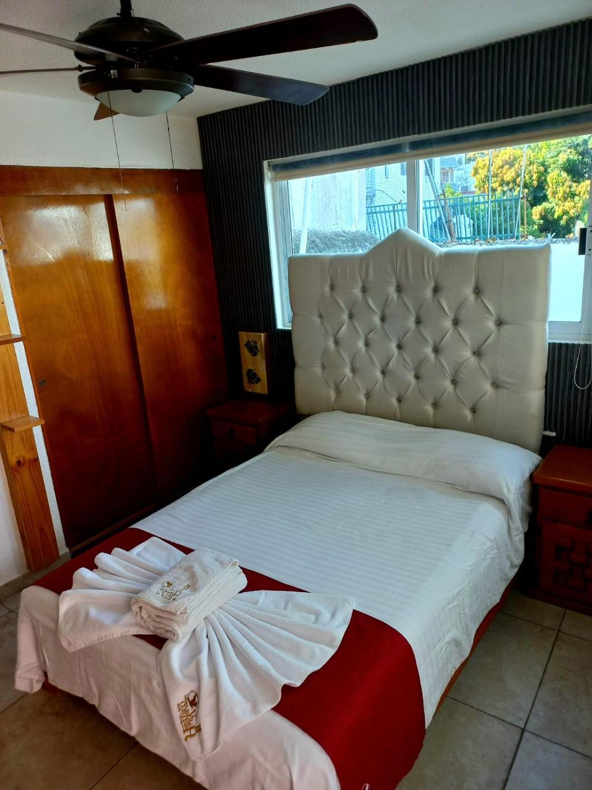 Habitación Deluxe (1 adulto + 1 niño)