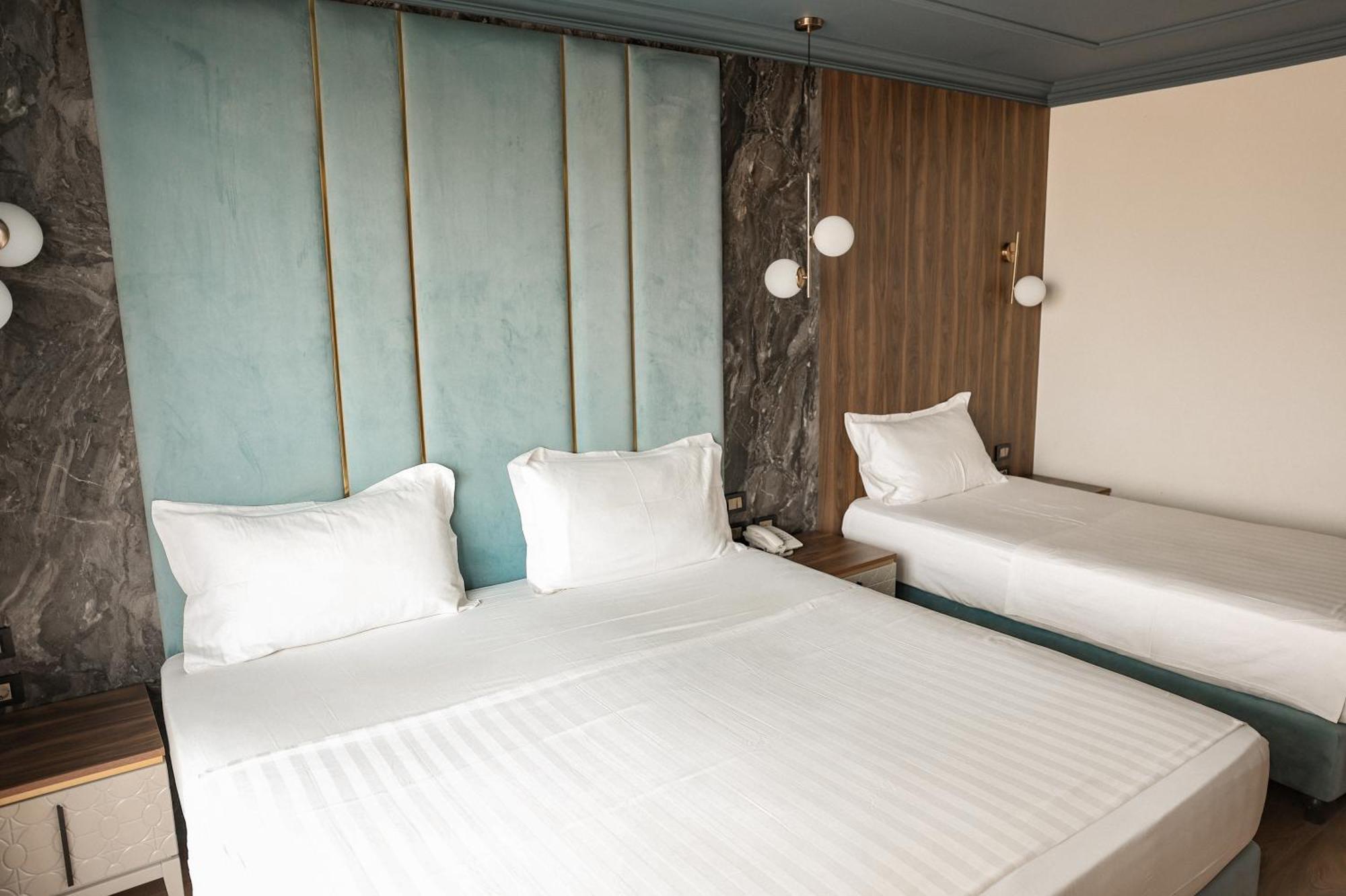 Deluxe Triple Room with Sea View