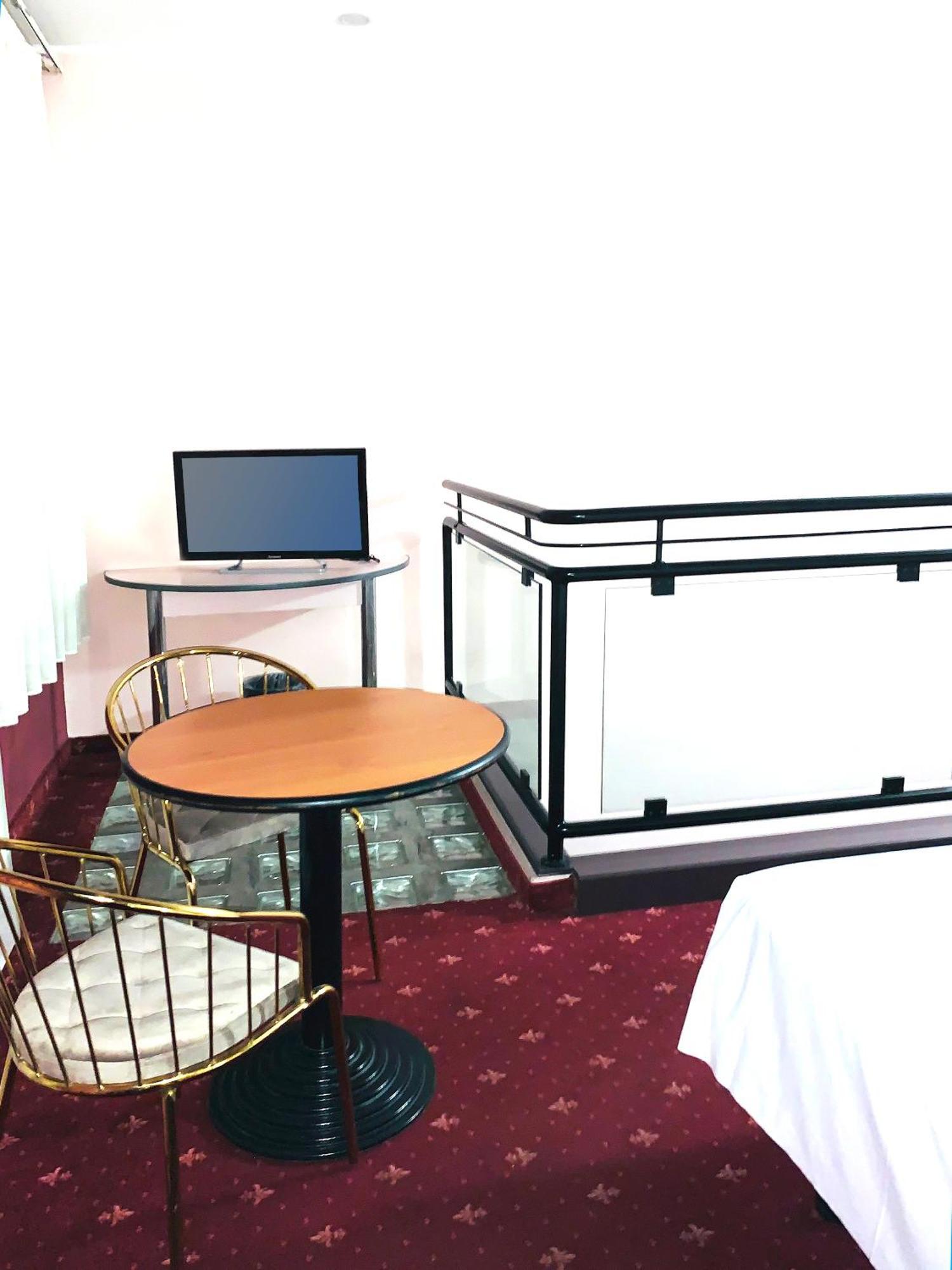 Habitación Triple con balcón