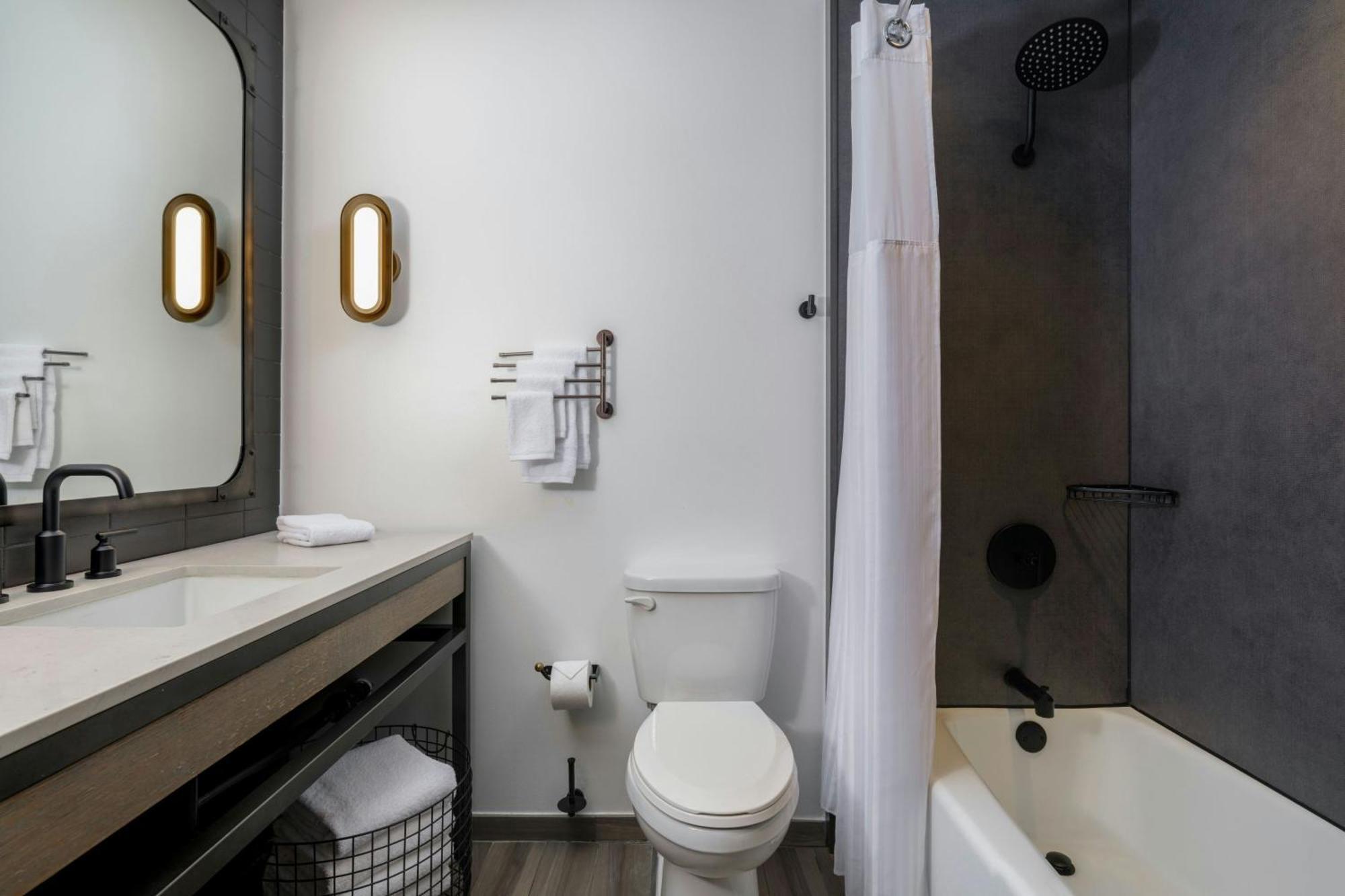 Queen Room Two Queen Beds Courtyard View Roll Shower Mobility Hearing Accessible