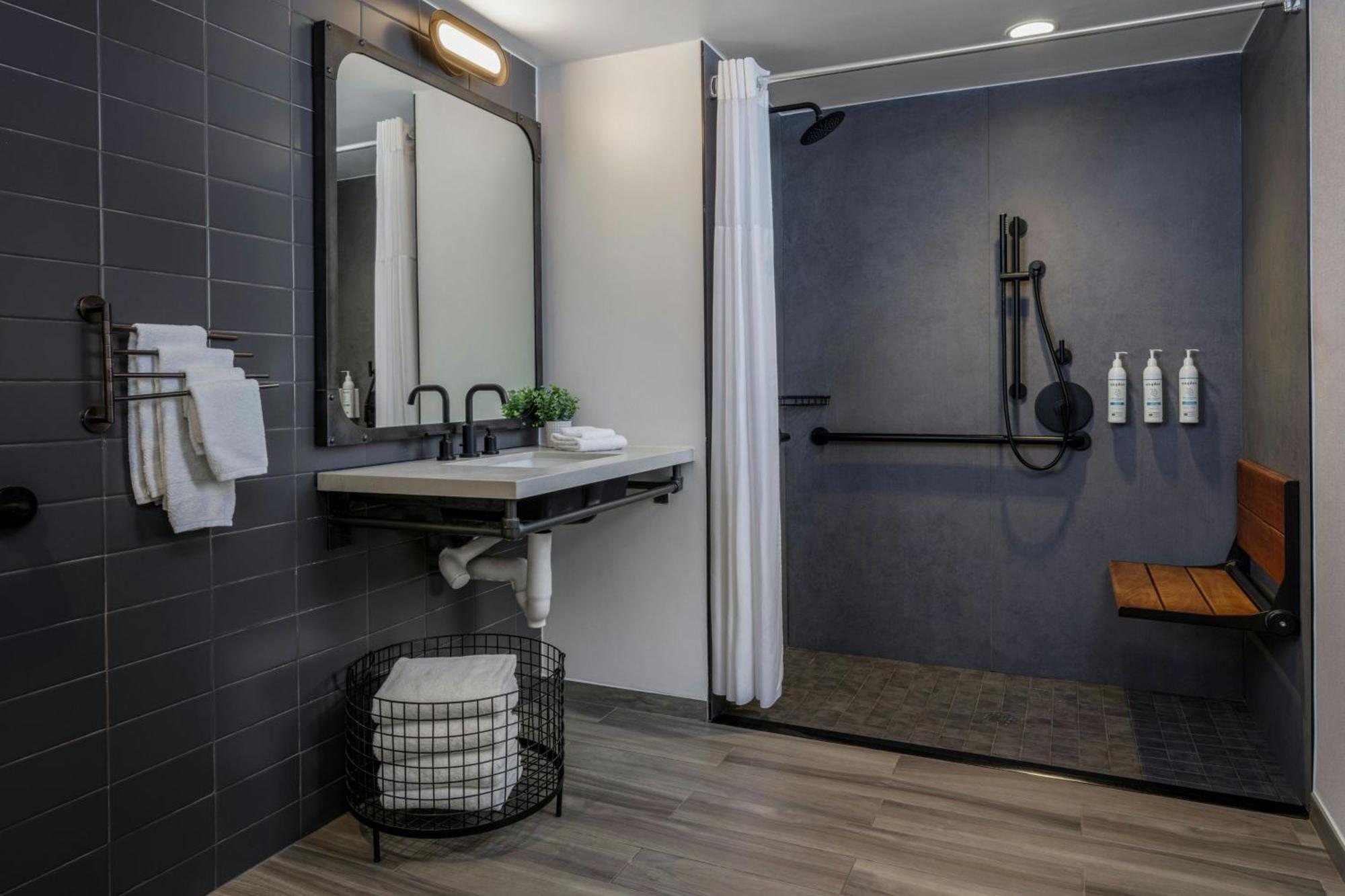 Queen Room Two Queen Beds Courtyard View Roll Shower Mobility Hearing Accessible