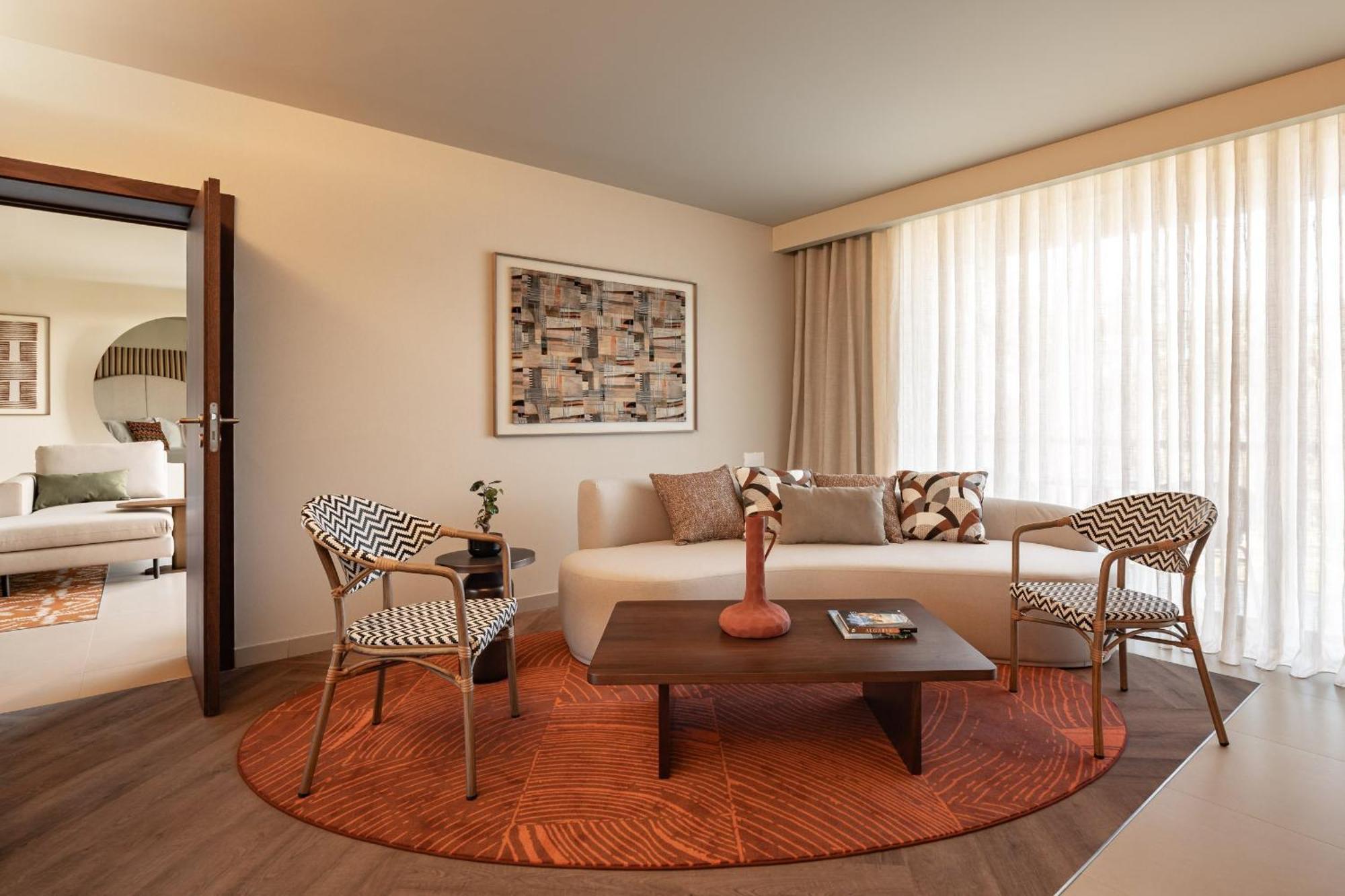 One-Bedroom Suite with Balcony and Pool View