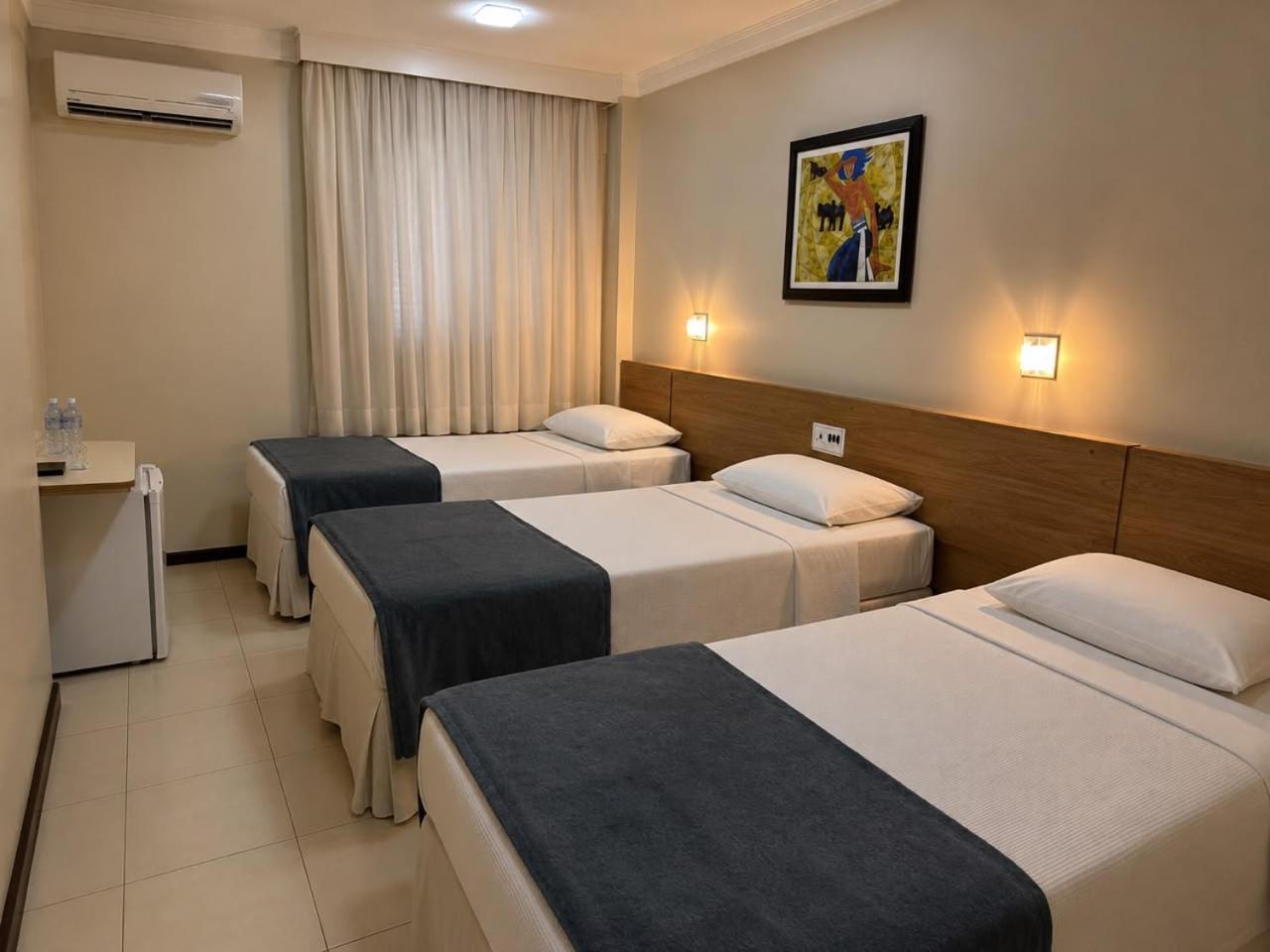 Quarto Triplo Luxo - 3 Camas de Solteiro