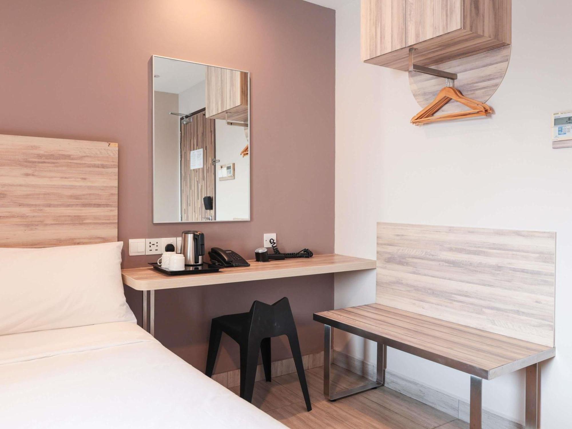 Habitación Triple Deluxe con 1 cama doble y 1 cama individual
