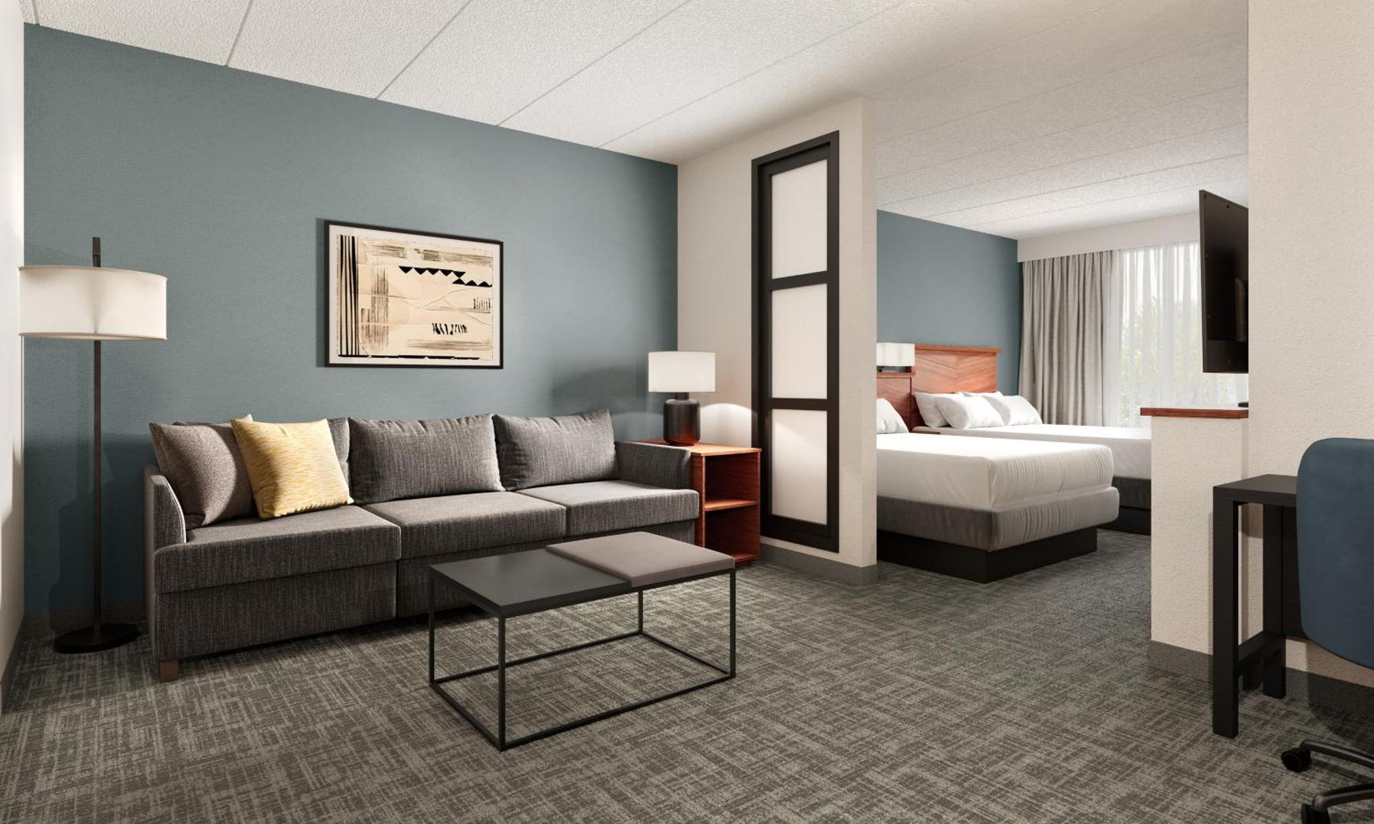 Suite voor 2 Personen met 2 Tweepersoonsbedden en Slaapbank