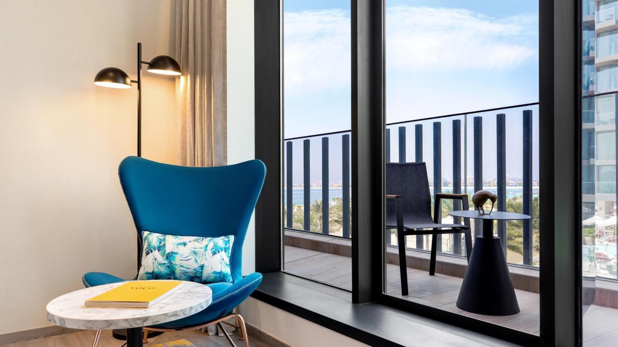 Deluxe King Room with Balcony and Side Sea View