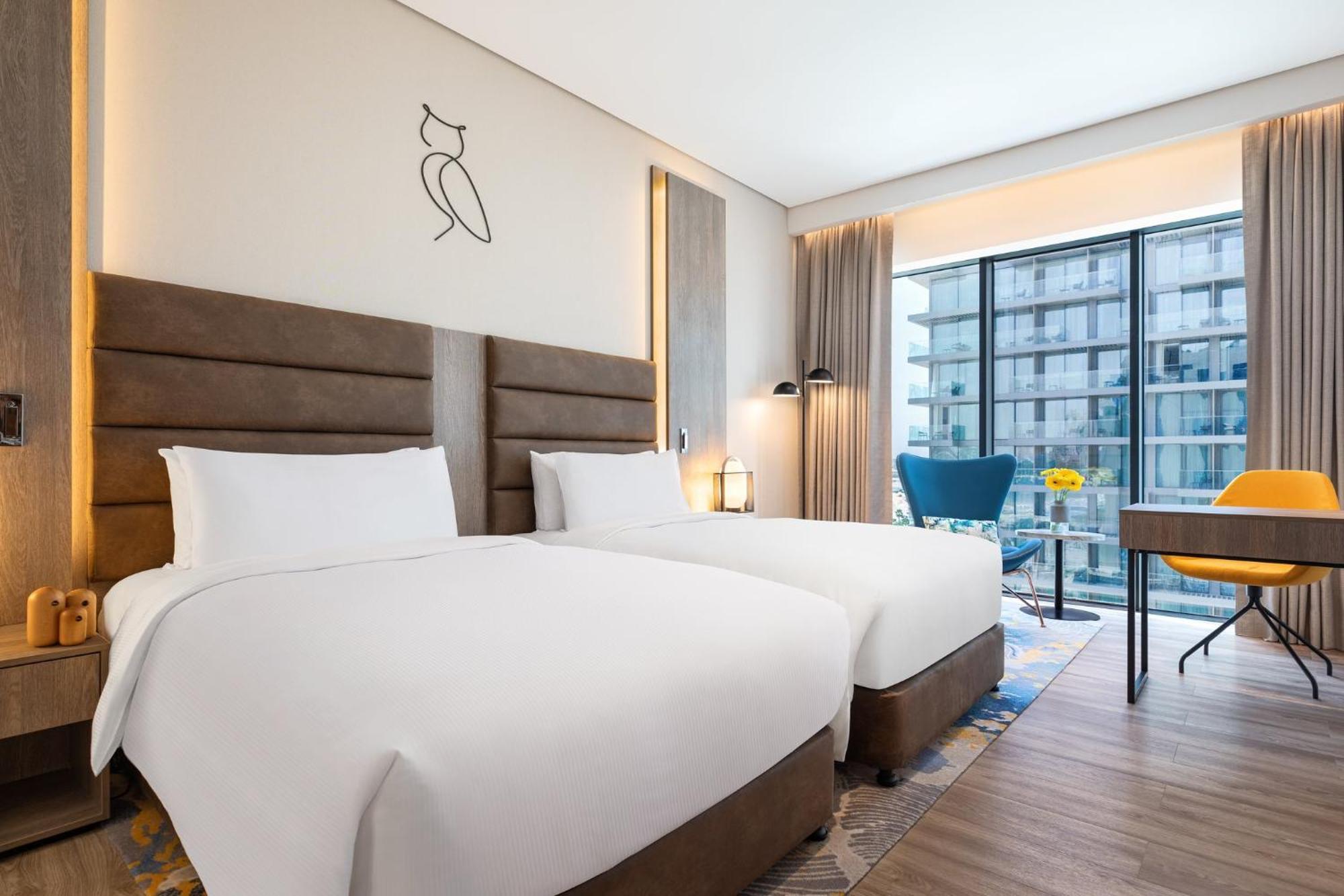 Deluxe Zweibettzimmer mit seitlichem Meerblick