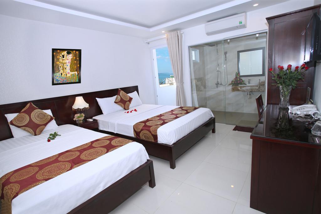 Phòng Deluxe 2 Giường Đơn có Ban công - Nhìn ra Biển