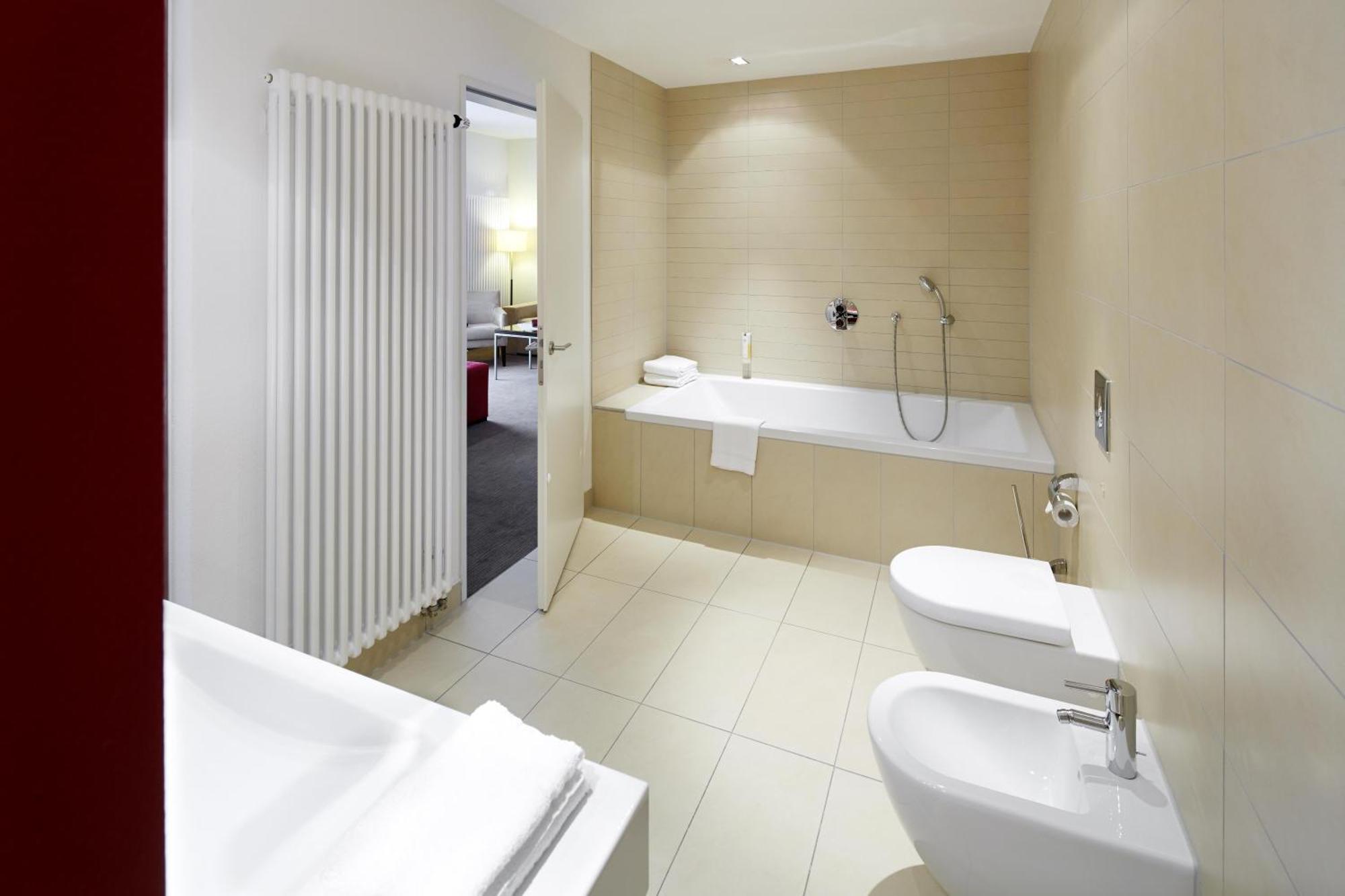 Suite met 2 Eenpersoonsbedden en Slaapbank