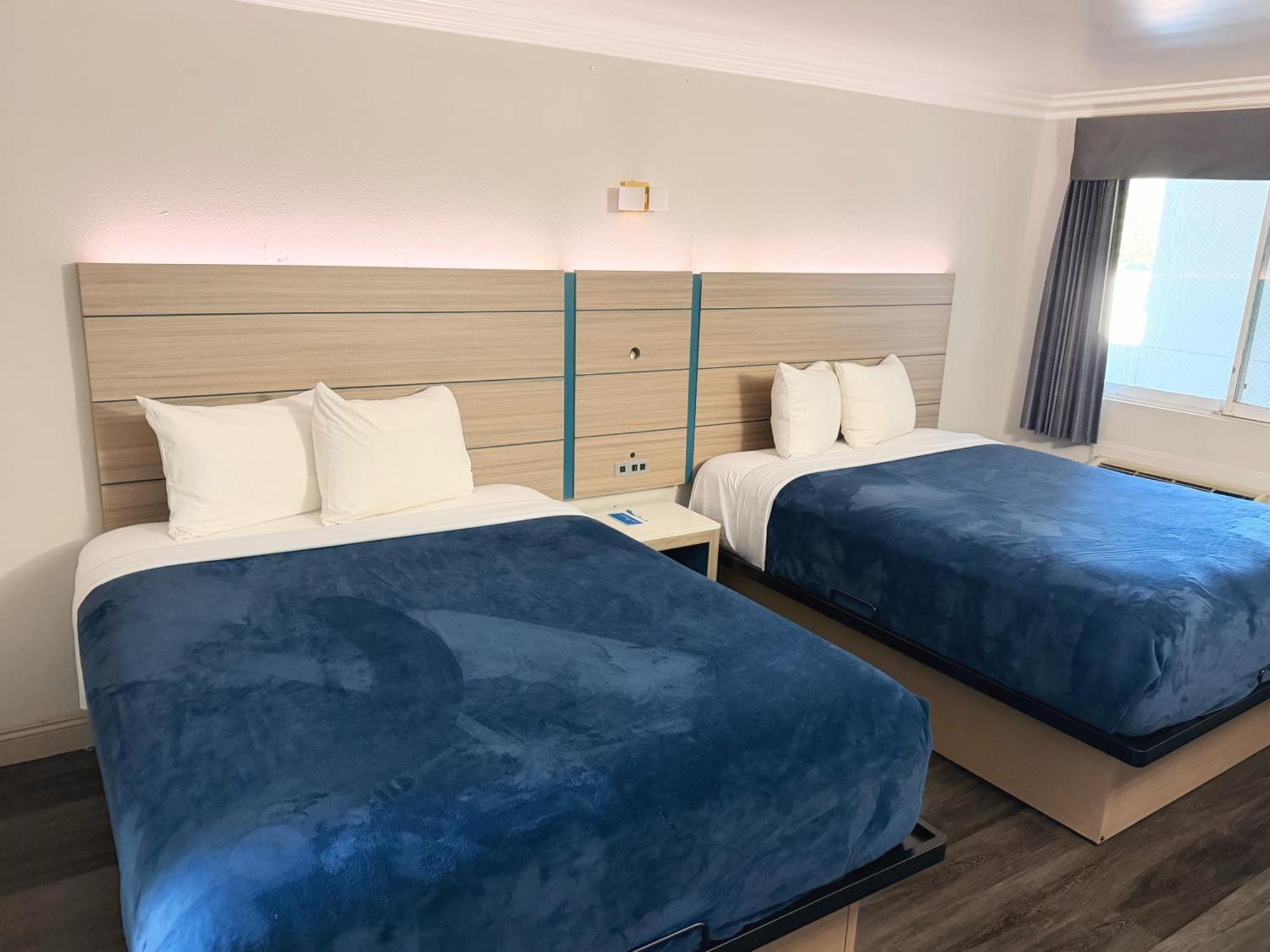 Quadruple Room Two Queen Beds Non Smoking or Exterior Corridor