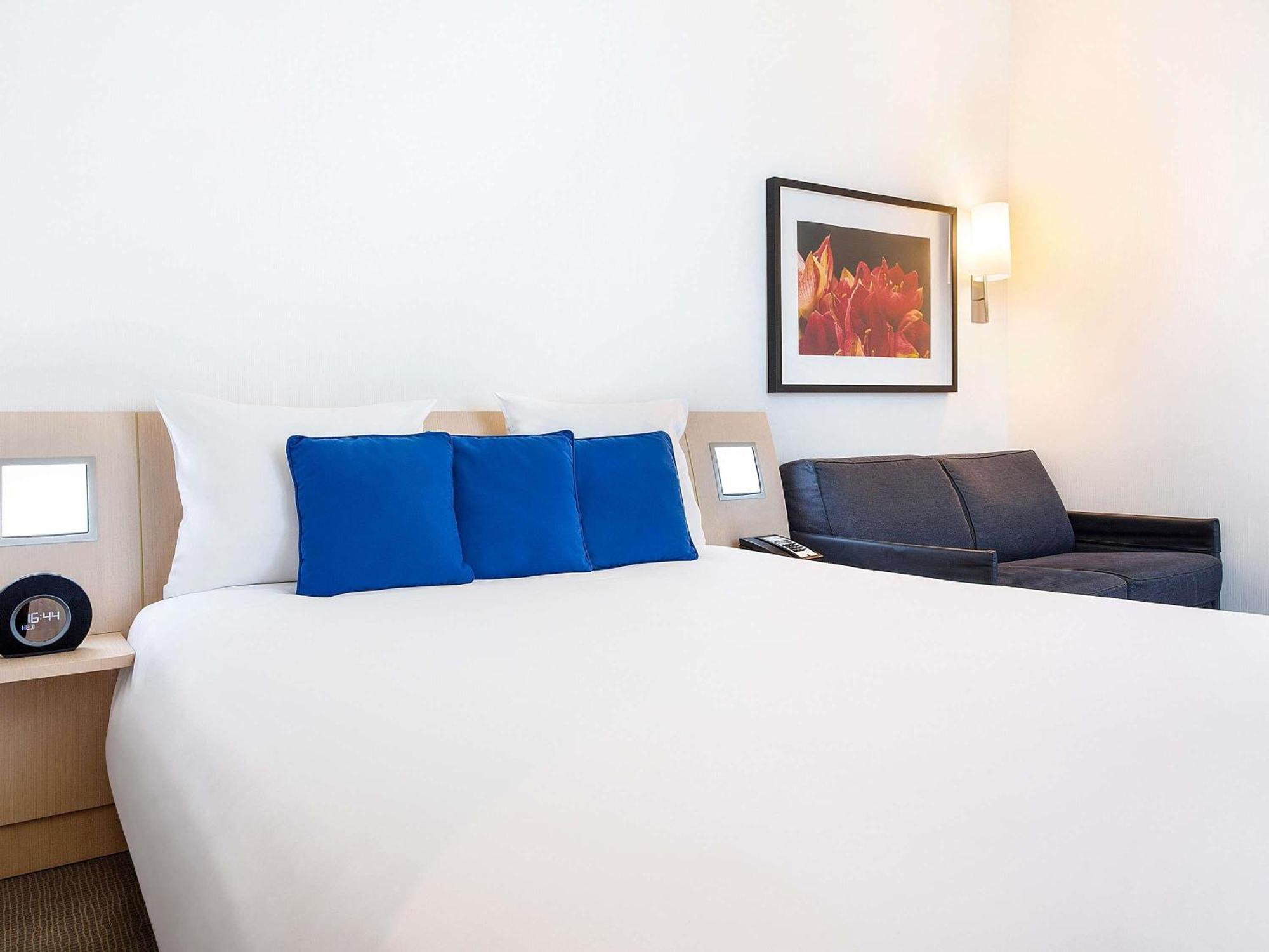 Quarto Queen Superior com Sofá-cama