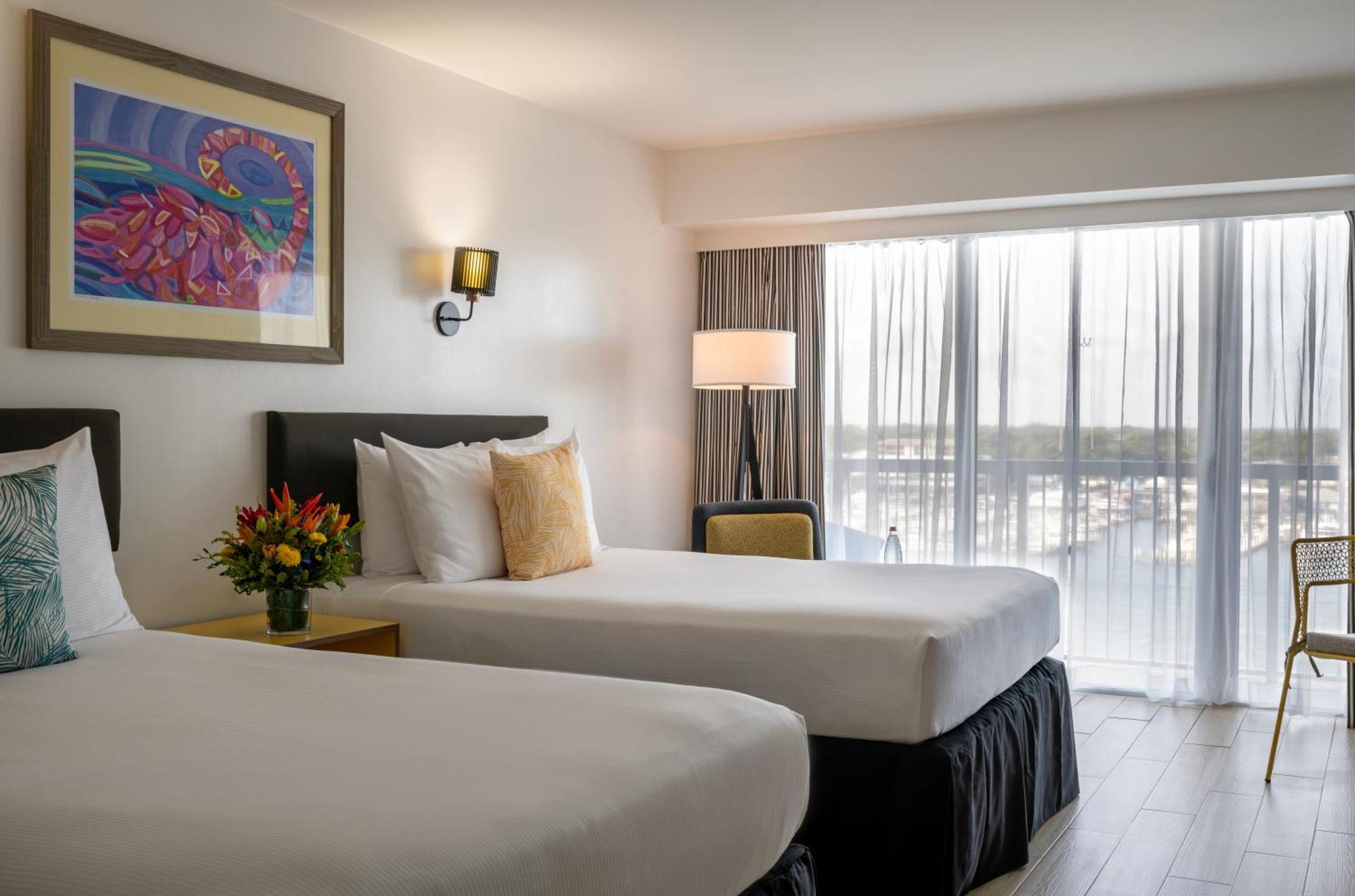 Deluxe Kamer met 2 Tweepersoonsbedden en Balkon - Uitzicht op de Haven