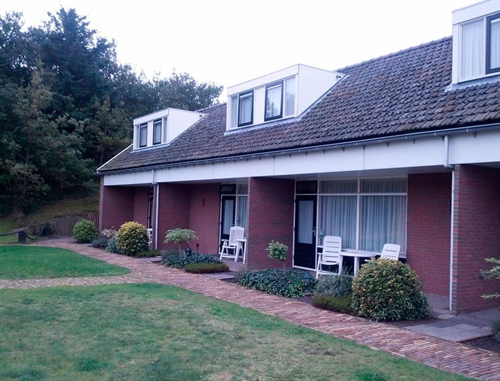 Vierpersoonskamer met Uitzicht op de Tuin.