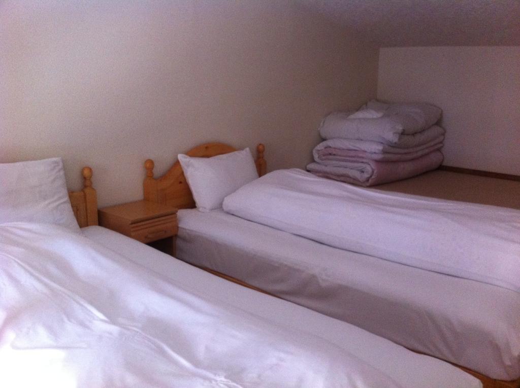 Quadruple Room with Shared Bathroom