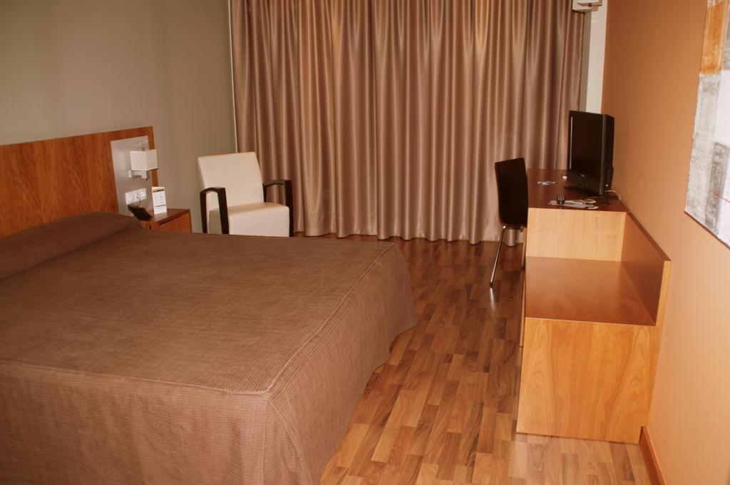 Chambre Lit Queen-Size Deluxe