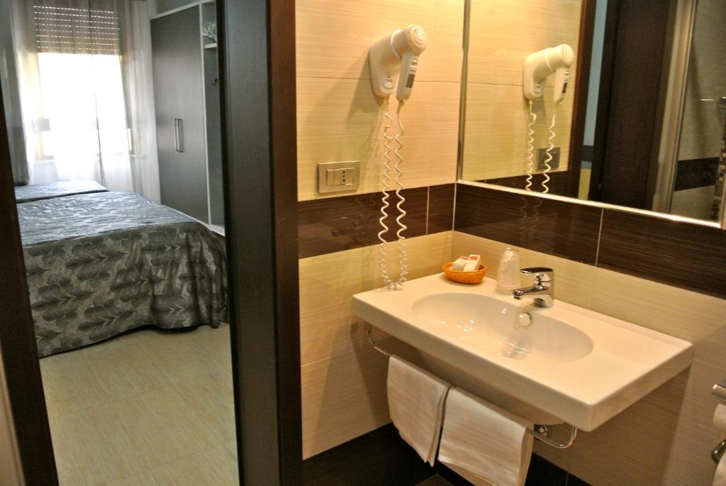 Quarto Standard com Cama de Casal ou 2 de Solteiro