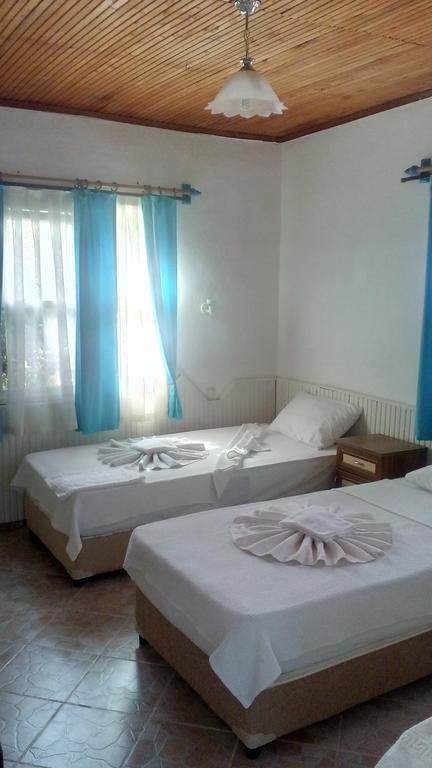 Üç Kişilik Oda