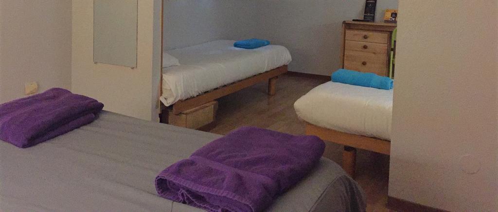 Quadruple Room with 1 Double Bed and 2 Single Beds