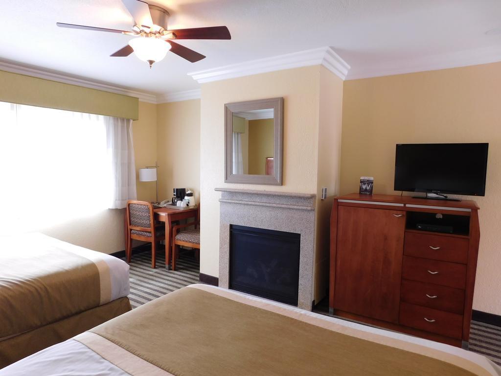Queen Room with Two Queen Beds and Fireplace