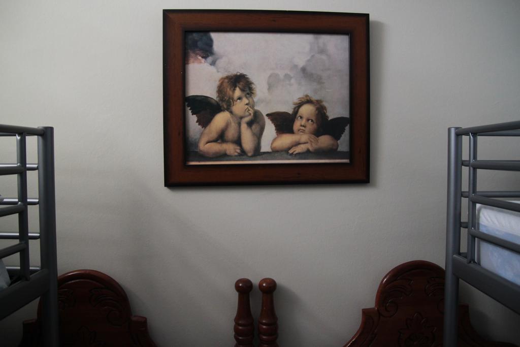 Cama en habitación femenina compartida de 4 camas