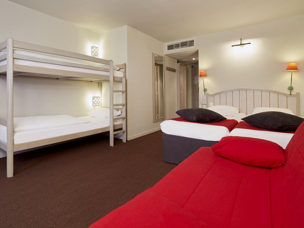 Standard Twin Room with 1 Sofa Bed and 2 Bunk Beds