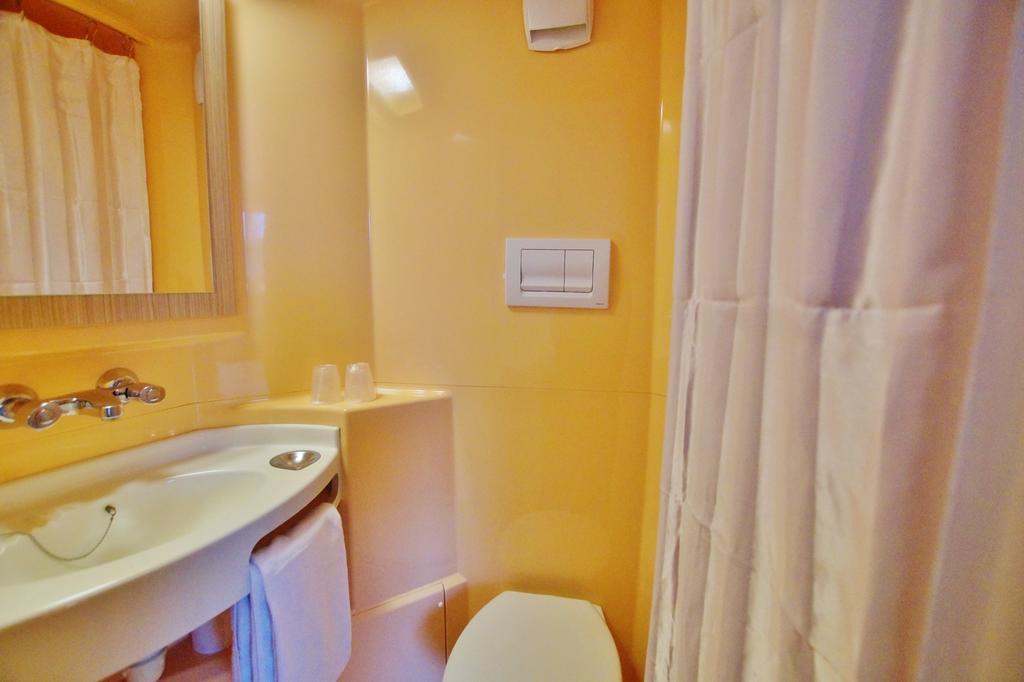 Chambre Triple (1 Lit Double et 1 Lit Simple)