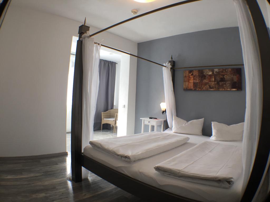 Deluxe tweepersoonskamer met balkon en uitzicht op zee