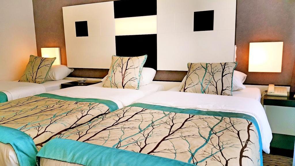 Standard Triple Room Side Sea View