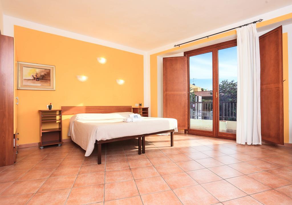 Chambre Triple Classique - Vue Partielle sur Mer
