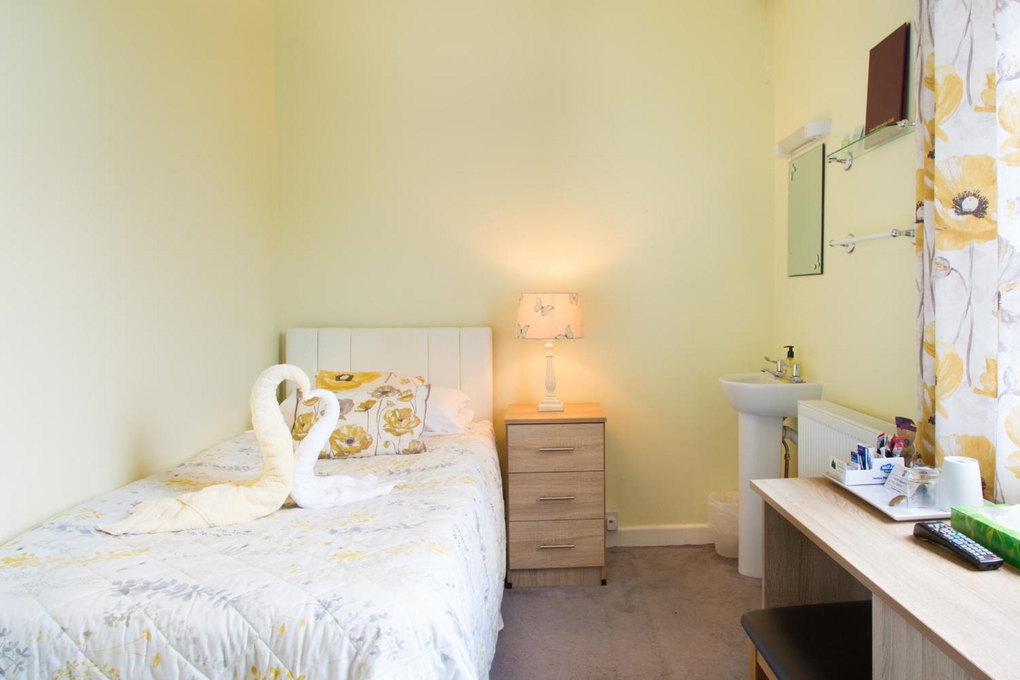 Single Room Shared Shower Toilet