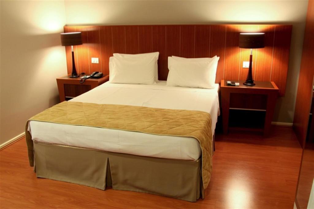 Quarto Executivo com Cama Queen-size
