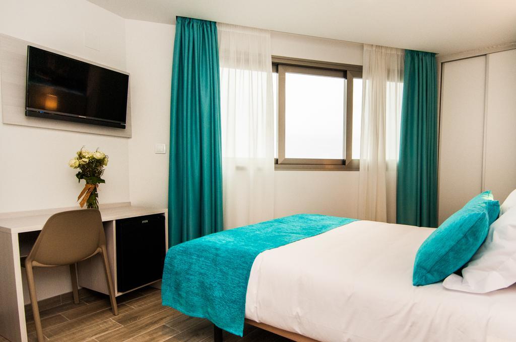 Triple Room (2 Adults + 1 Child)