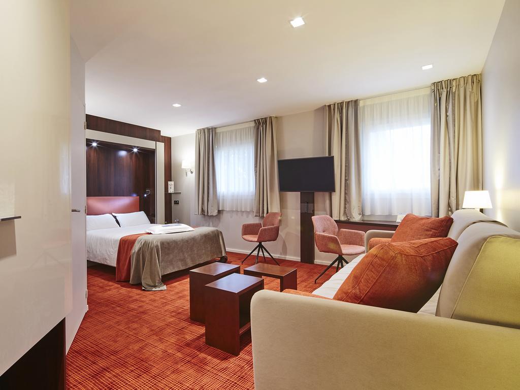 Quadruple Room - One Double Bed and 2 Single Beds