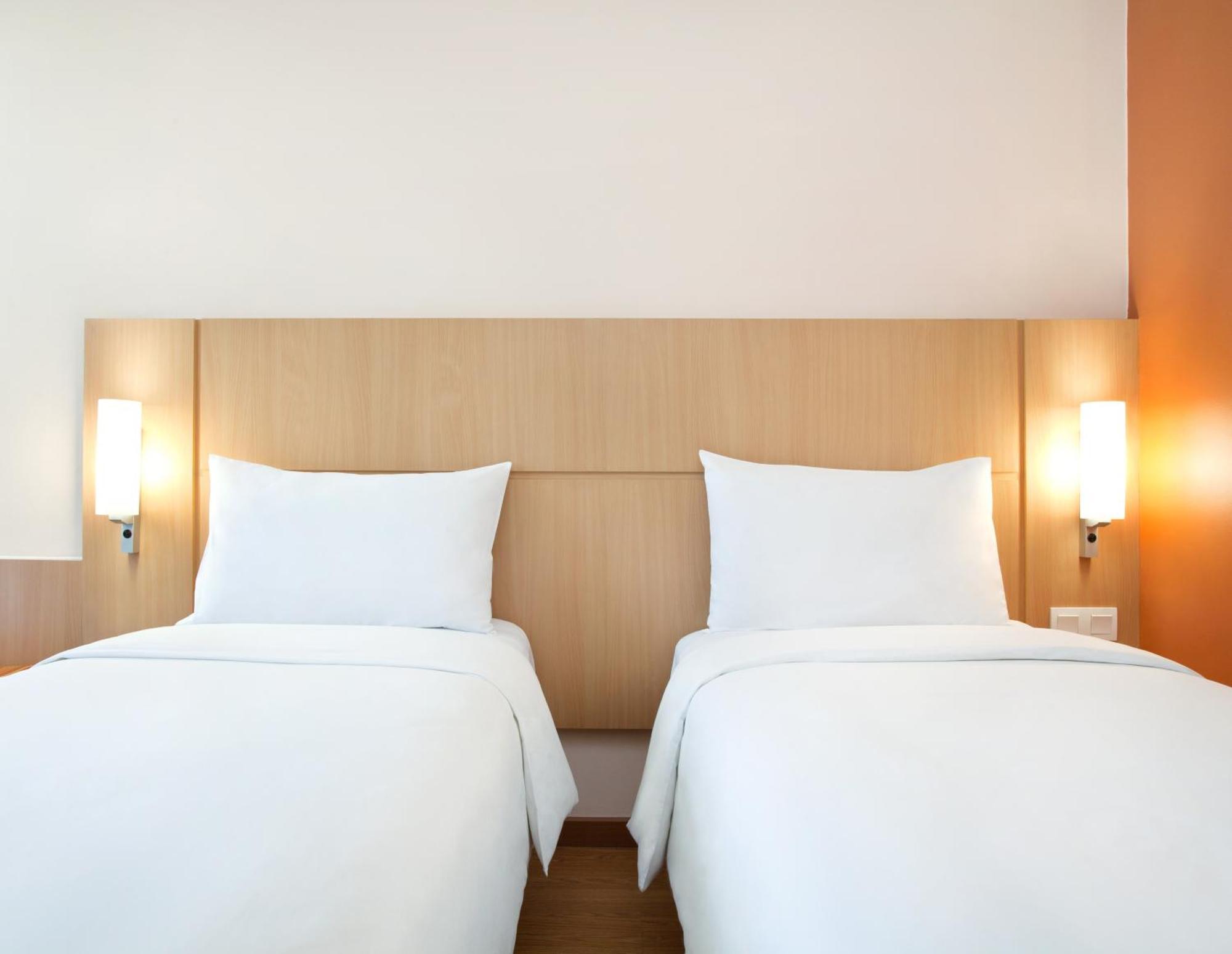 Kamar Keluarga dengan Tempat Tidur Queen dan Dua Tempat Tidur Single