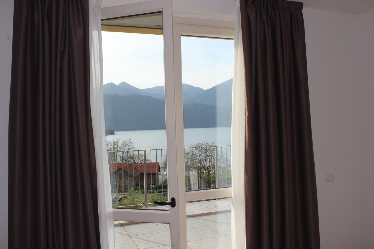 Dreibettzimmer mit Terrasse und Seeblick