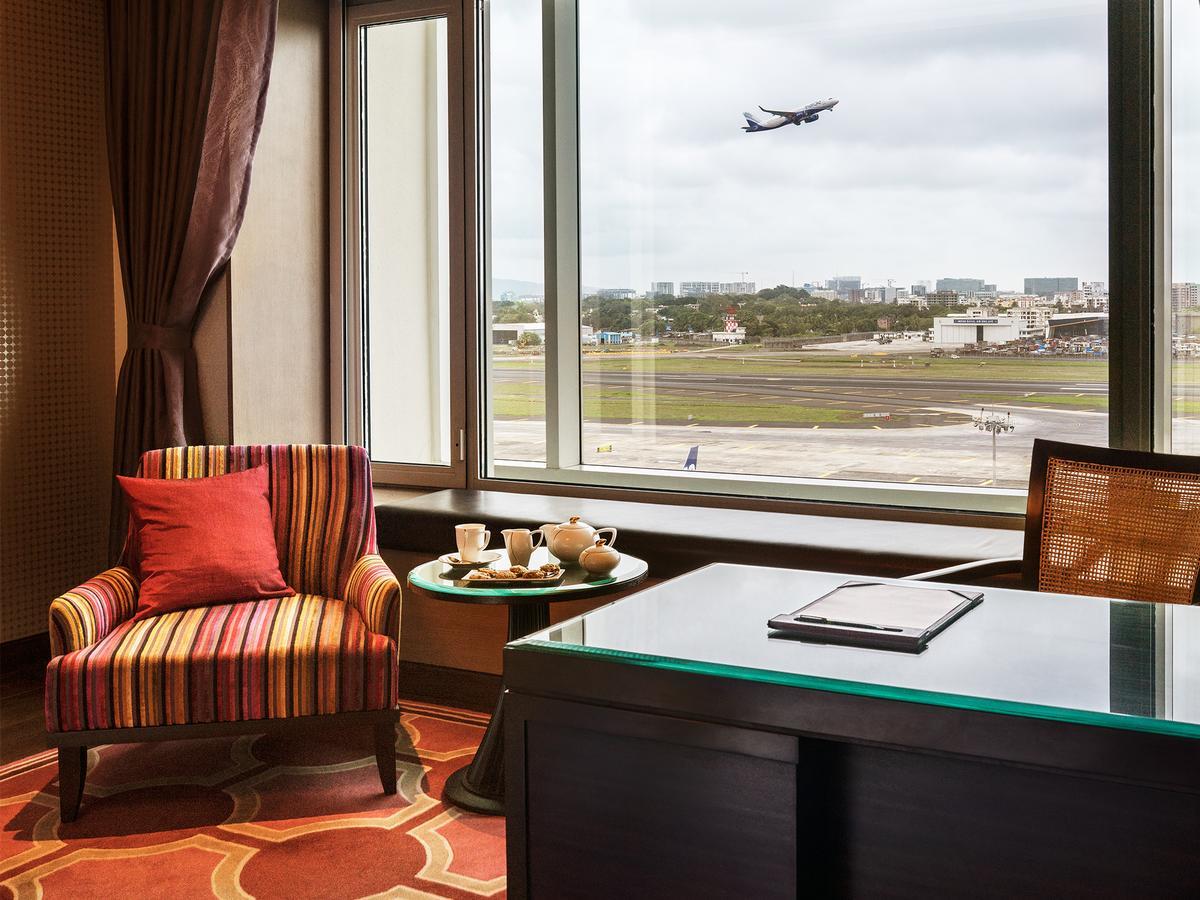 Taj Club Room Runway View King Bed with Breakfast, Complimentary One-way Airport Transfer, High-Tea & Evening Cocktail Hours