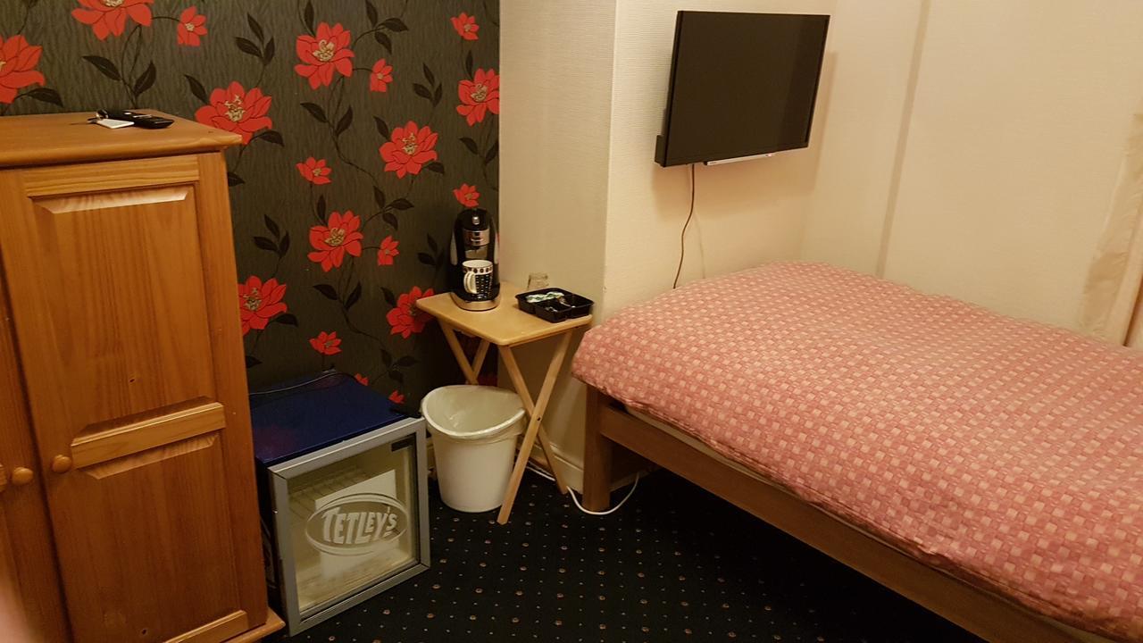 Single Room with Shared Shower and Toilet