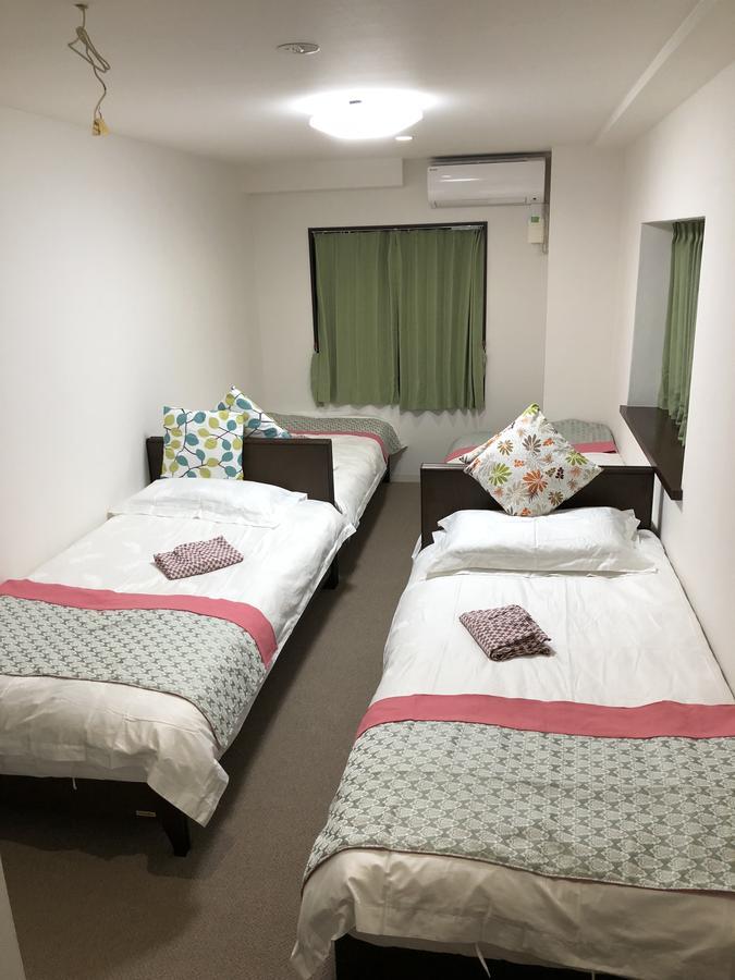 Quadruple Room with Private Bathroom