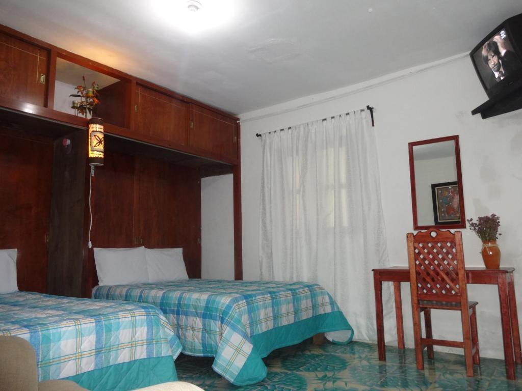 Habitación Cuádruple - vistas al jardín