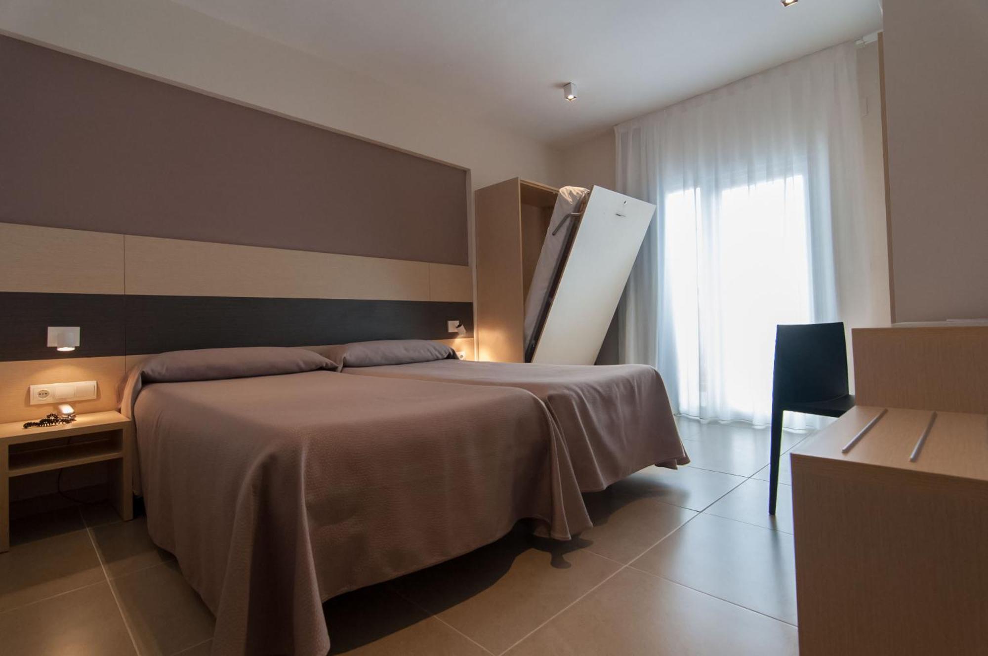 Triple Room (2 Adults + 1 Child)