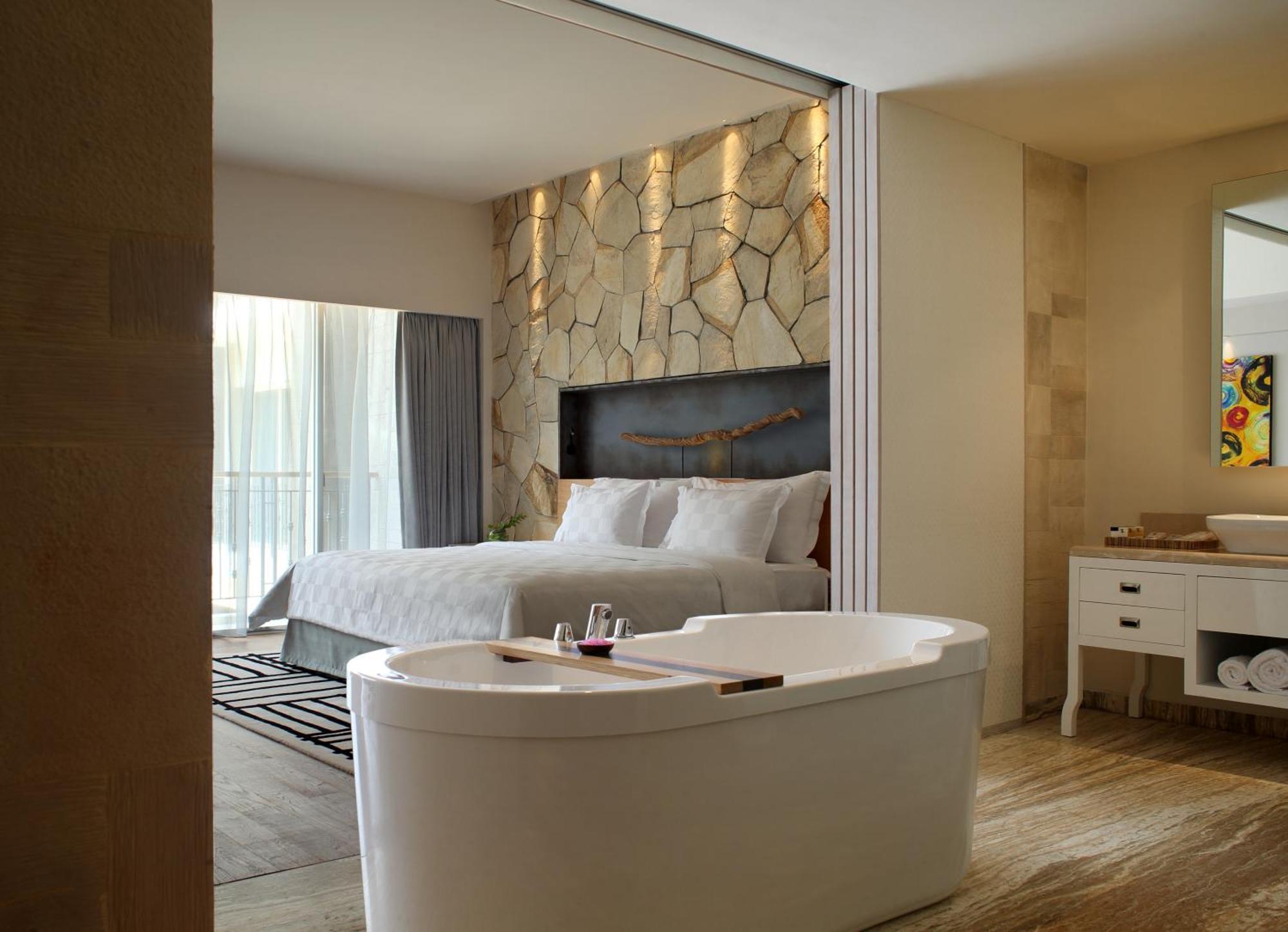 TSand Suite with All Day Breakfast, Daily Restocked Mini-bar and other Free Benefits