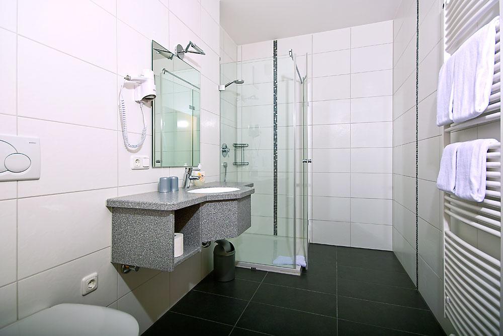 Suite mit Kingsize-Bett und Balkon